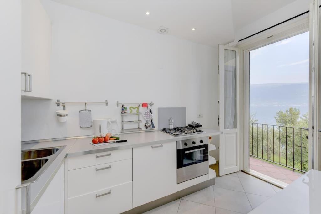 Oleandro Apartment Directly On The Lake Gargnano Esterno foto